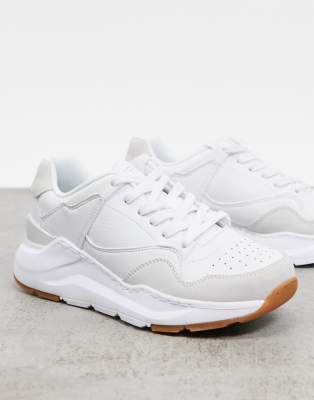 white sketcher trainers