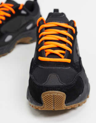 orange and black skechers