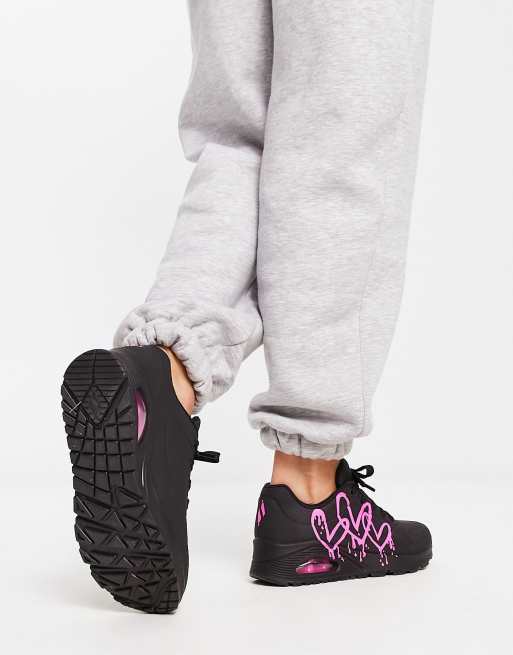 Skechers Uno sneakers with neon graffiti heart print in black ASOS