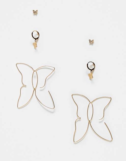 Skinny Dip 3 pack of earrings with butterfly shape details in gold tone