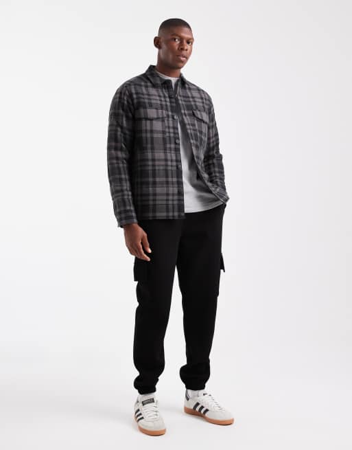 Skinny sweatpants in black poly cotton with cargo pockets