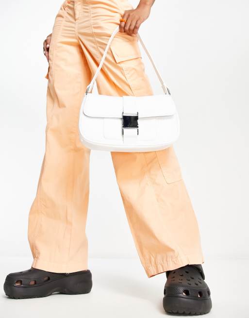 Skinnydip buckle shoulder bag in white croc