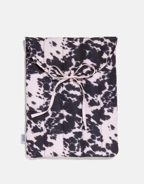 Skinnydip Cow print quilted bow laptop sleeve 16" in brown - view 1