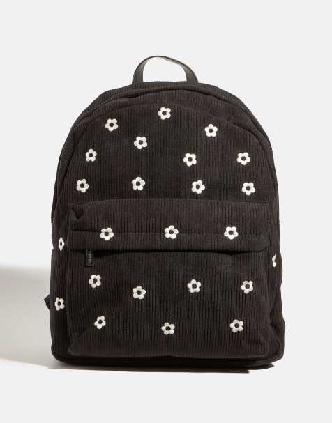 Skinnydip Ditsy flower embroidered backpack in black - view 1