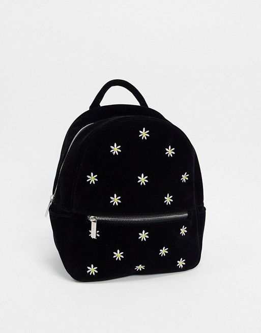 Skinnydip embroidered daisy backpack in black