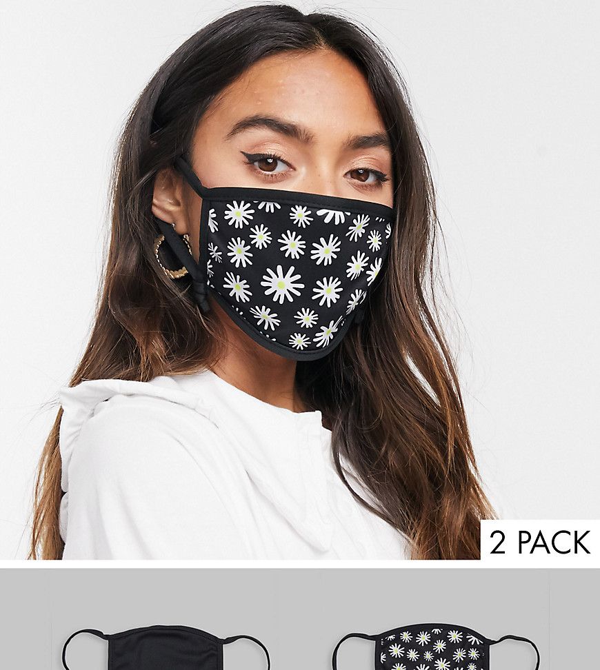 Skinnydip Exclusive 2 pack face covering with adjustable straps in plain black and daisy print