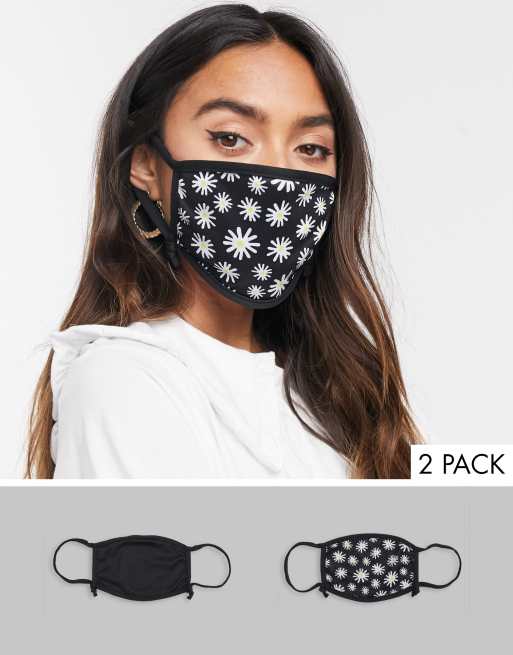 Skinnydip Exclusive 2 pack face covering with adjustable straps in plain black and daisy print
