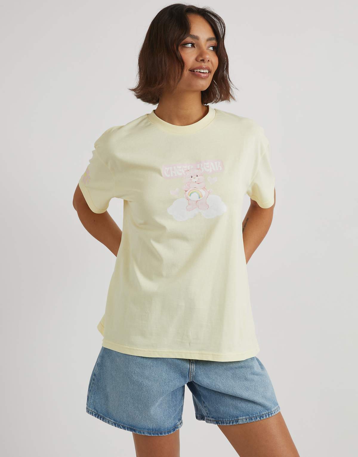 Skinnydip london care bears cheer bear t-shirt in yellow