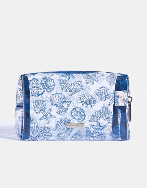 Skinnydip london sea shells makeup bag in blue - view 1