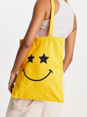 Skinnydip London smile tote bag in yellow