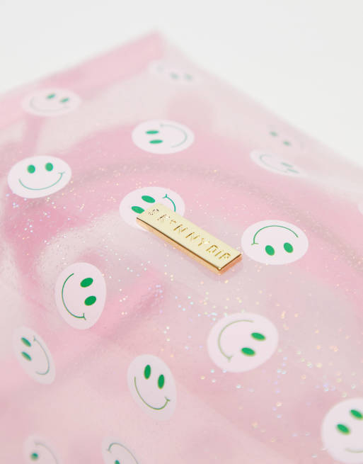 Skinnydip makeup bag with smile face print in pink