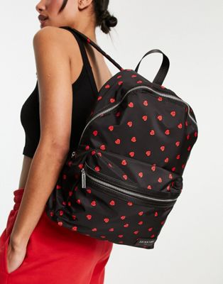 Skinnydip margot nylon backpack with heart smile face print in black