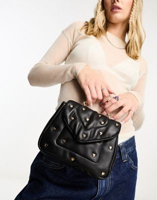 Skinnydip padded grab bag with heart studs in black