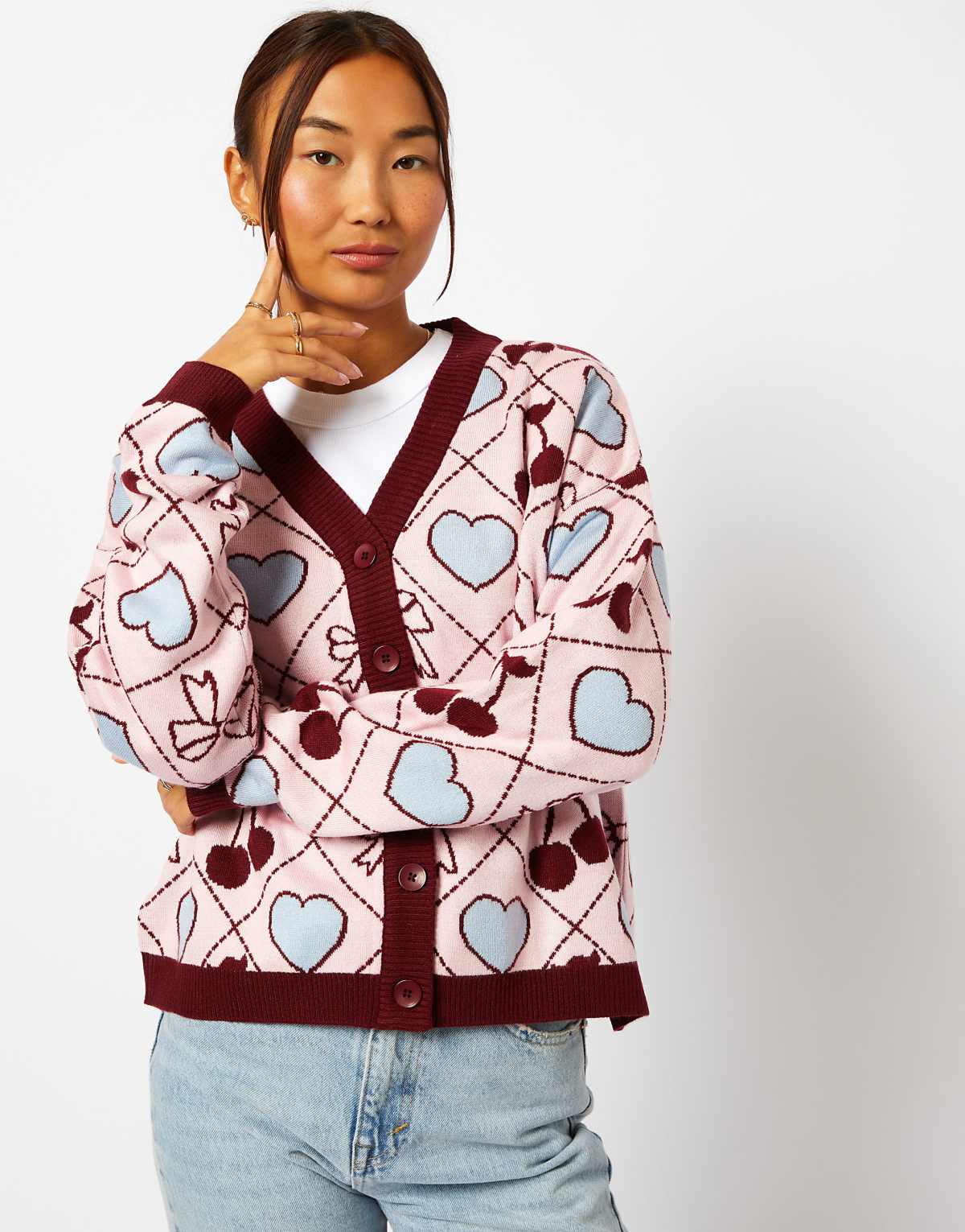 Skinnydip Quilted cherry & bow cardigan in multi in pink