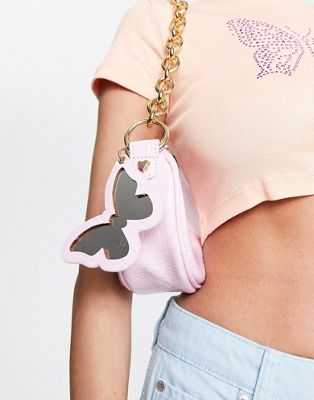 Skinnydip quilted crossbody bag in light pink with butterfly mirror chain