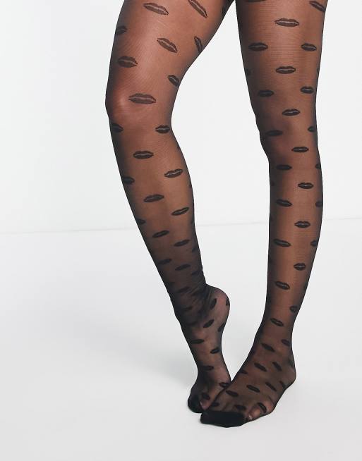 Skinnydip sheer black tights with lips print ASOS