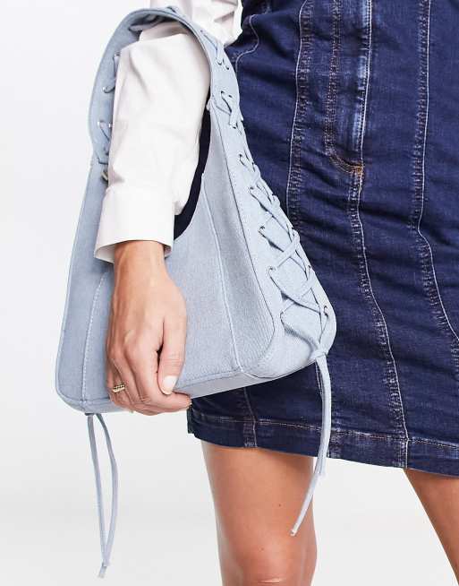 Skinnydip shoulder bag in washed denim with lace-up detail