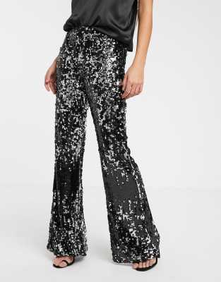 black sequin flared trousers