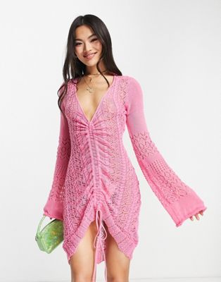 SNDYS crochet bell sleeve mini dress with ruched detail in pink | ASOS