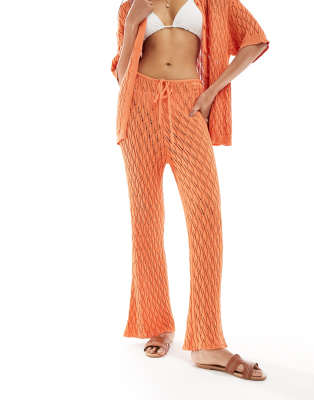 crochet flared pants in orange - part of a set