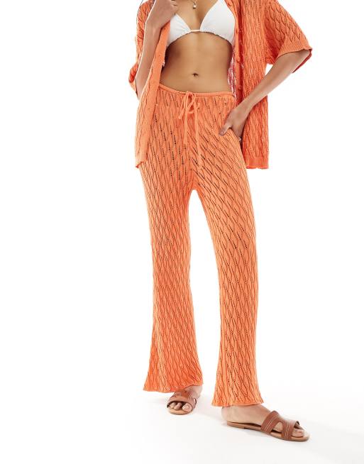 SNDYS – Orange virkade byxor i utsvängd design, del av set