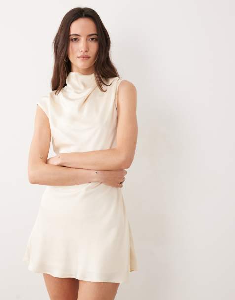 SNDYS satin high neck open back detail sleeveless mini dress in cream