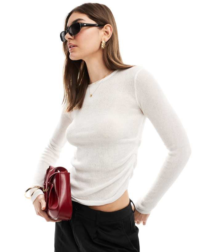 SNDYS semi sheer fine knit long sleeve top in white | ASOS