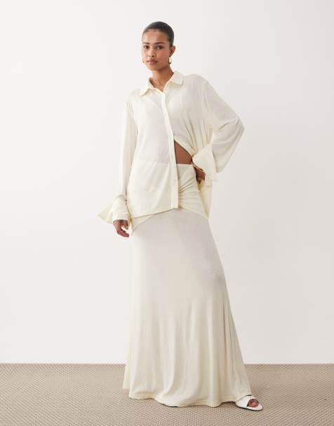 SNDYS soft fine knit semi sheer ruched twist front detail maxi skirt in off white - part of a set - view 1