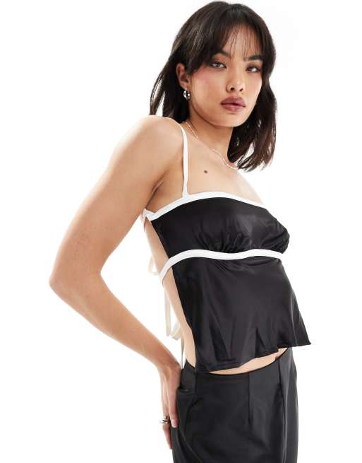 SNDYS - Top in raso con spalline sottili e allacciatura sul retro nero con cuciture a contrasto sul busto in coordinato