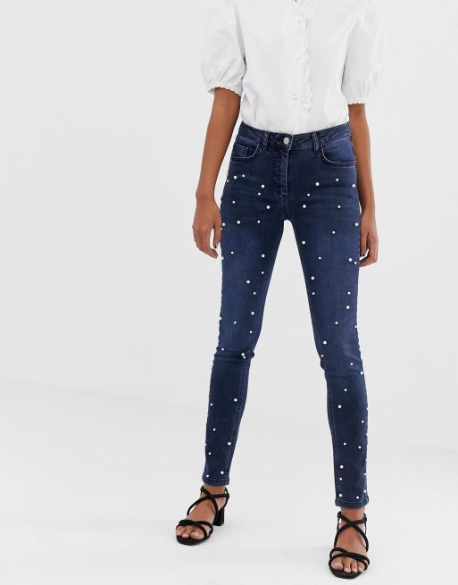 Womens jeans with hot sale pearls on them