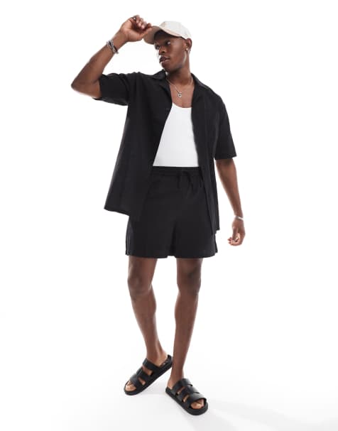 Sol Beach textured drawstring beach shorts in black - view 1