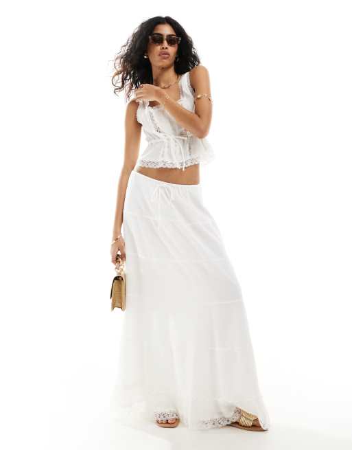 Something New styled by Claudia Bhimra boho maxi skirt with lace detail in white part of a set ASOS