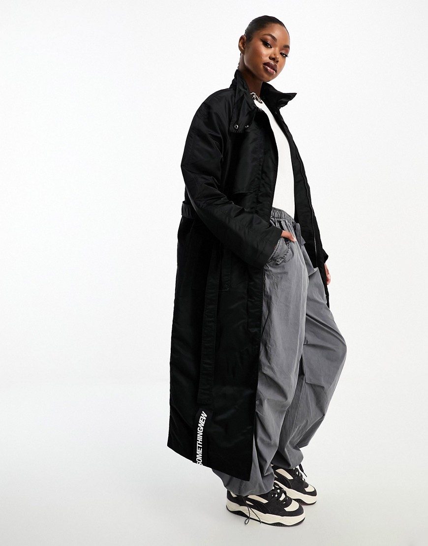 Something New X Aisha Potter maxi nylon trench coat with label in black