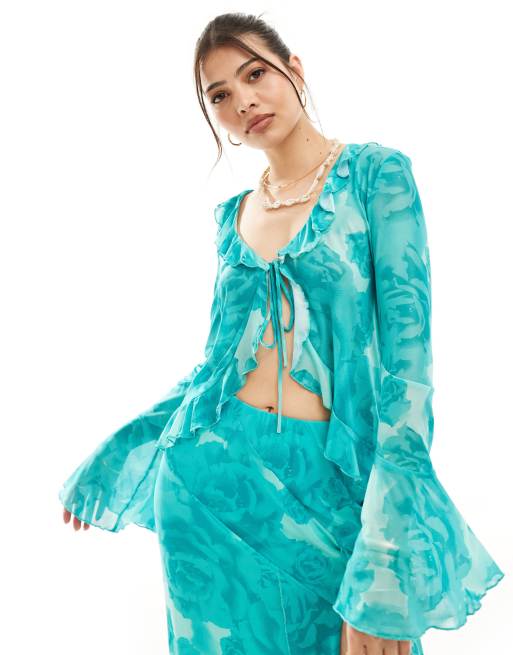 Something New x Cenit - Top trasparente con volant e allacciatura frontale con stampa blu oceano in coordinato