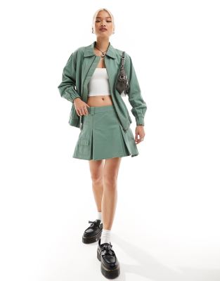 Something New X Chloe Frater denim box pleat cargo mini skirt co-ord in washed watercress green  - view 1