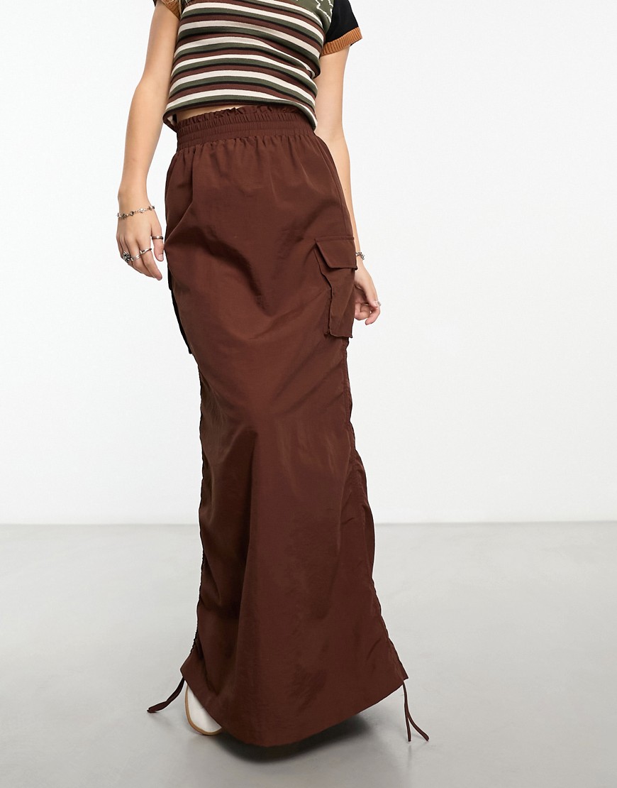 Something New X GORPECORE SQUAD ruched side cargo maxi skirt in brown