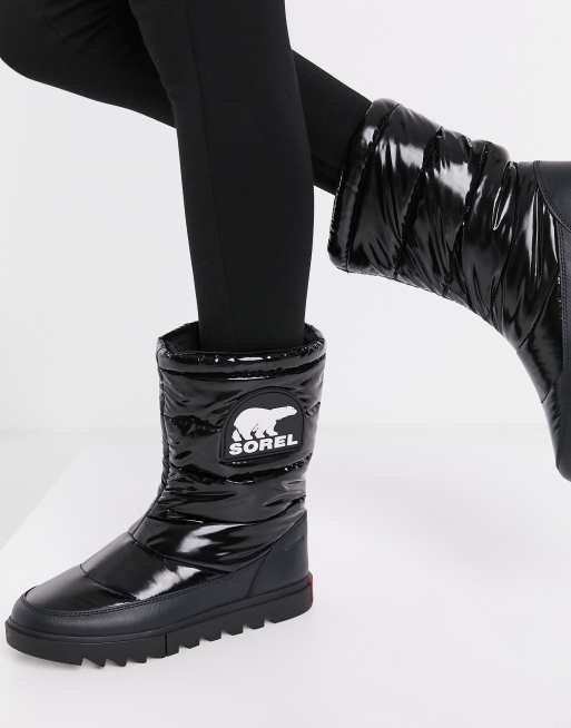 Sorel Joan Of Arctic Bottes de neige rembourr es et vernies Noir