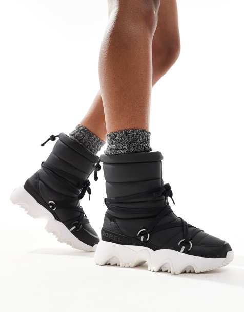 Sorel – Kinetic Impact NXT WP – Wasserdichte, gepolsterte und gesteppte Schneestiefel in Schwarz und Meersalz mit Fleecefutter - view 1