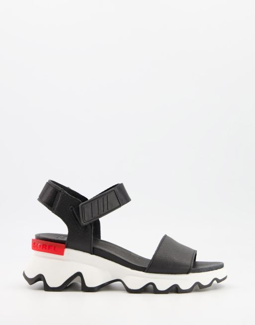 Sorel Kinetic sporty sandals in black ASOS