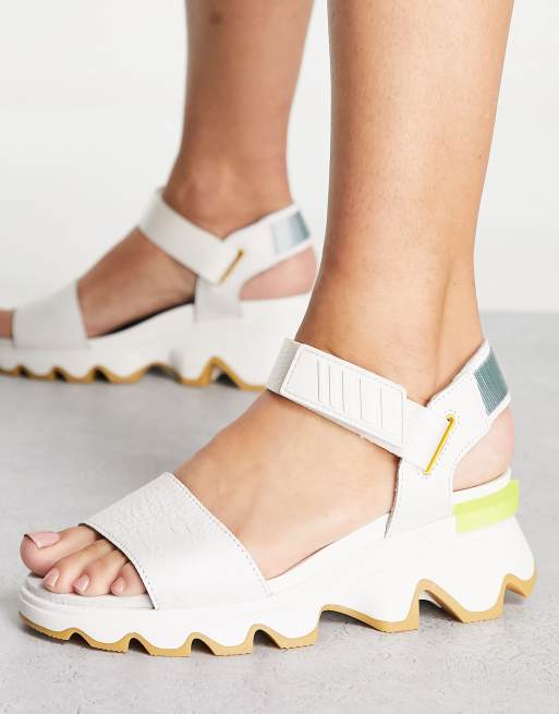 Sorel Kinetic sporty sandals in white ASOS