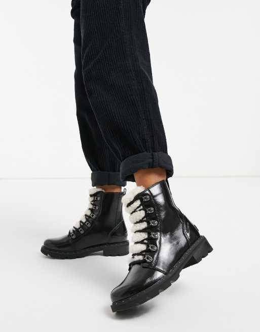 Sorel Lennox Lace Cozy flat ankle boot in black patent with lining | ASOS