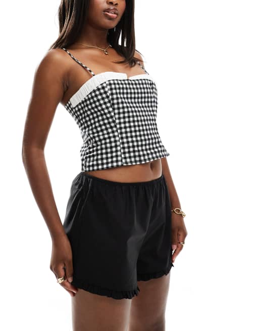 Sort ASOS DESIGN - Shorts i poplin med flæser