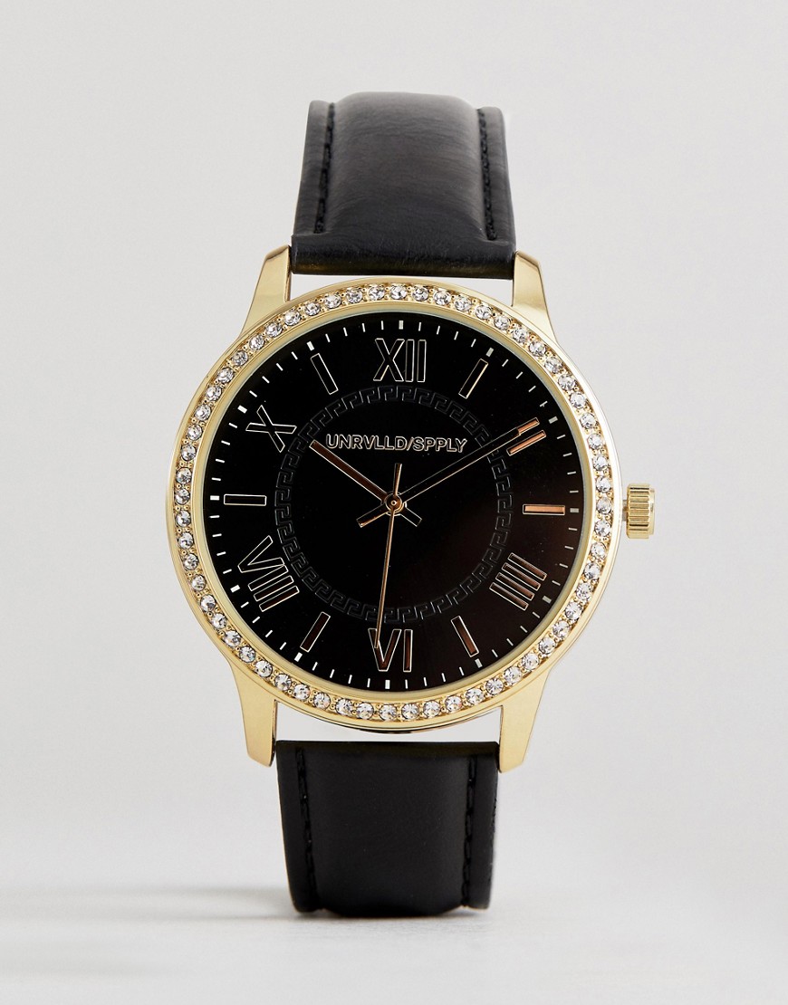 Sort og guldfarvet armbåndsur med romertal og krystalsten fra ASOS DESIGN