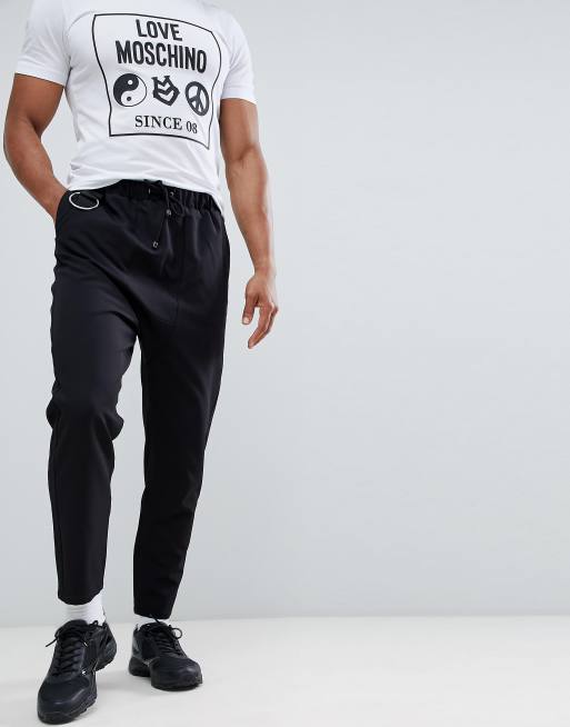 Sorte posede bukser med metaldetaljer fra ASOS DESIGN