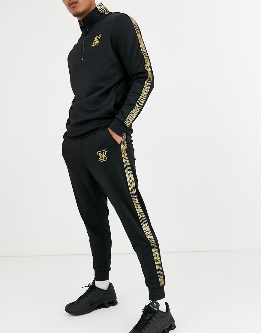 Sorte skinny-joggingbukser med guld logo fra SikSilk