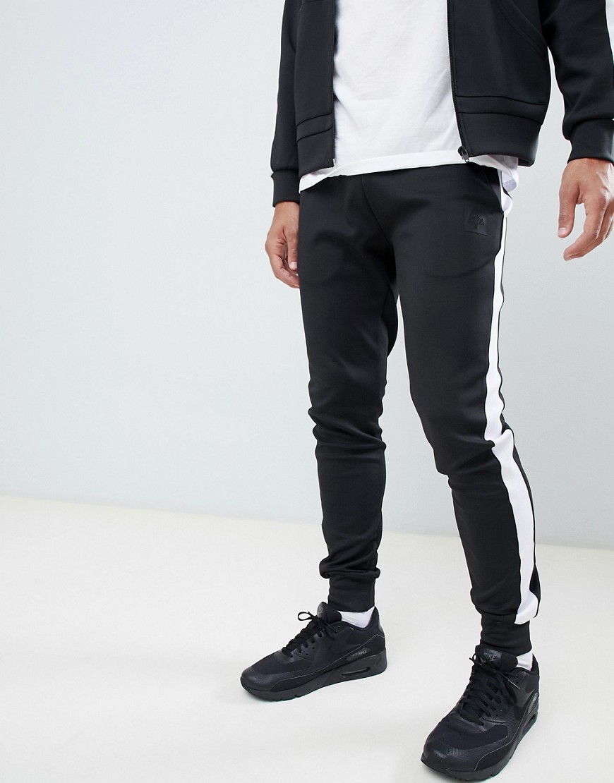 Sorte skinny joggingbukser med sidestribe i polyester fra Hype