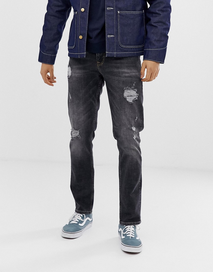 Sorte slim-fit ripped jeans med stretch fra ASOS DESIGN
