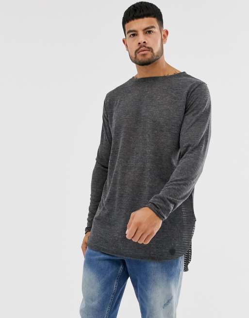 Soul Star – Grå stickad topp med rundad nederkant i skirt material