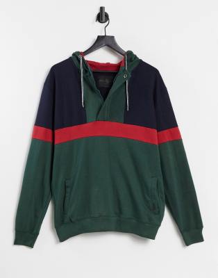 green hooded jumper