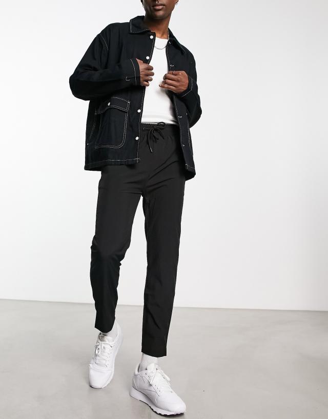 Soul Star skinny fit stretch woven cropped pants in black